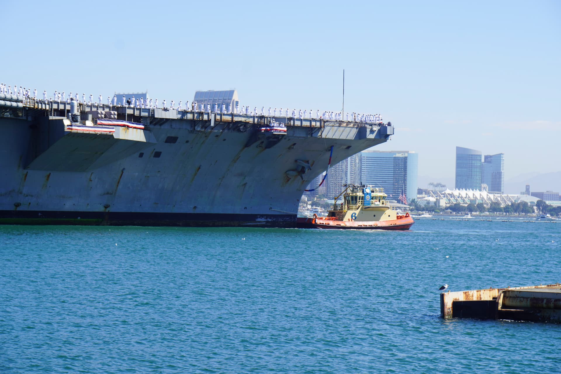 USS Abraham Lincoln aircraft carrier returns to port after a combat mission in the Middle East, in San Diego on Oct. 8, 2026. (Brad Jones/The Epoch Times)
