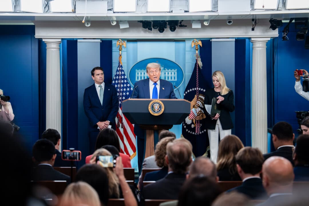 President Donald Trump (C) alongside then-Attorney General Pam Bondi (R), and then-Deputy Attorney General Todd Blanche (L) during a news conference in the James S. Brady Press Briefing Room at the White House on June 27, 2025. (Madalina Kilroy/The Epoch Times)