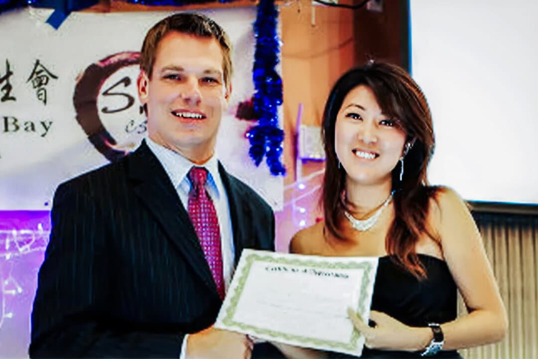 Christine Fang, also known as Fang Fang, with then-Dublin, Calif., City Councilmember Eric Swalwell at a student event in San Francisco in October 2012. When Fang was enrolled as a student at California State University–East Bay, she was tasked with networking with and befriending up-and-coming U.S. officials on behalf of communist China, the FBI said. (Screenshot/Social media)