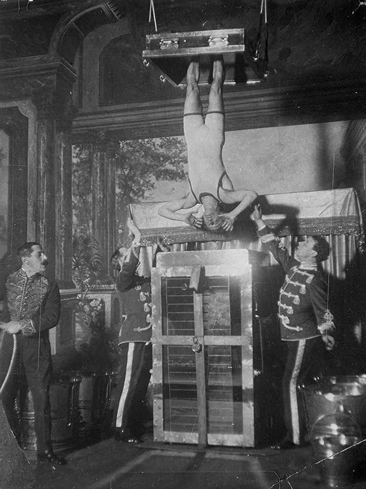 Houdini performing the Chinese Water Torture Cell. Library of Congress. (Public Domain)