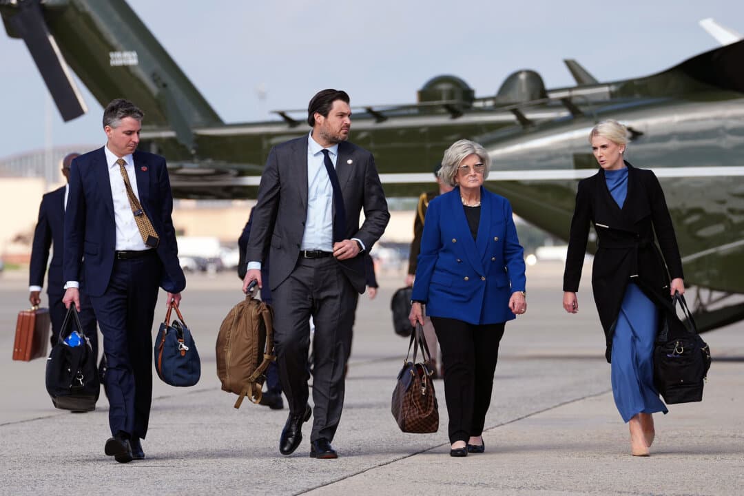 White House Chief of Staff Susie Wiles and Executive Assistant to President Donald Trump Natalie Harp board Air Force One at Joint Base Andrews, Md., on Oct. 16, 2026. Trump was traveling to Georgia to headline a campaign rally for Republican Senate candidate Mike Collins, who is challenging incumbent Sen. Jon Ossoff (D-Ga.). (Eric Lee/Getty Images)