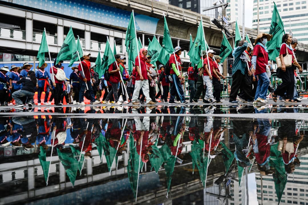 Demonstrators protest the International Monetary Fund and World Bank Group in Bangkok on Oct. 16, 2026, as the institutions hold their annual meetings in the Thai capital. (Anthony Wallace/AFP via Getty Images)