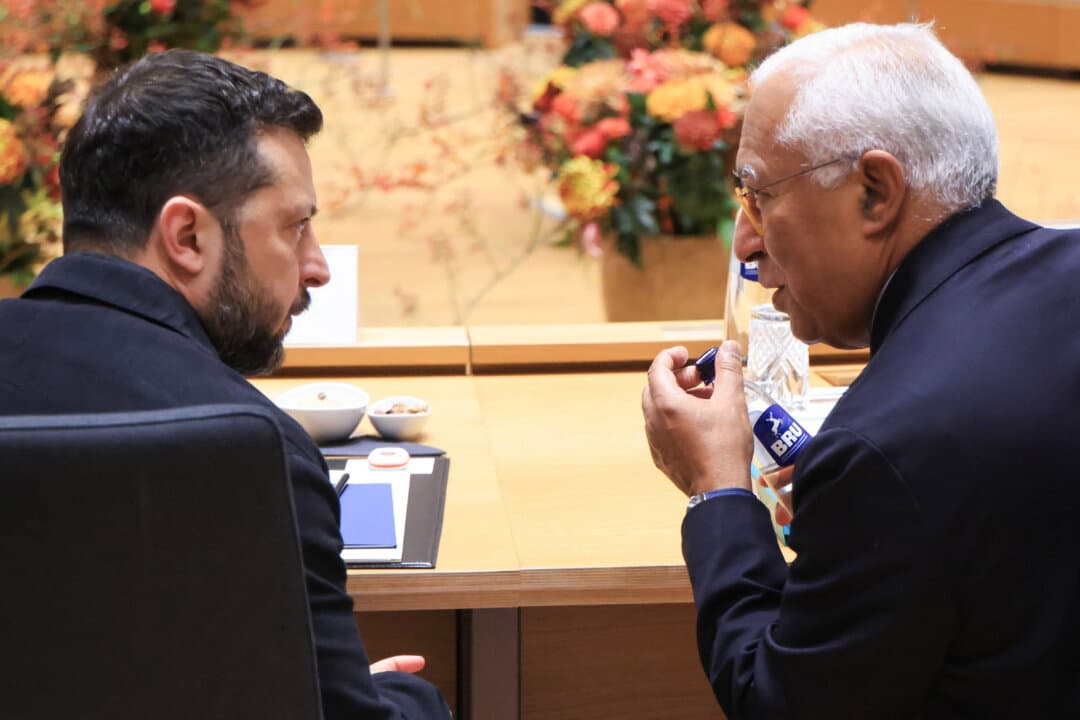 Ukrainian President Volodymyr Zelenskyy and European Council President Antonio Costa speak before a roundtable at an EU summit in Brussels on Oct. 16, 2026. EU leaders gathered to discuss the bloc's next long-term budget as they seek an agreement before next year's French presidential election. (Ludovic Marin/AFP via Getty Images)