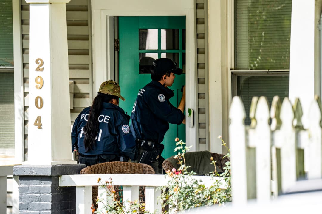 Homeland Security Investigations police search the home of Rep. Ilhan Omar (D-Minn.) in Washington on Oct. 12, 2026. (Andrew Leyden/Getty Images)