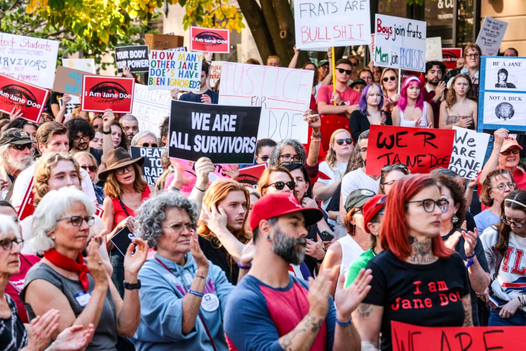 Protesters rally in support of a former Cornell University student Jane Doe at Ithaca Commons in Ithaca, New York, on Oct. 13, 2026. Doe is suing the university over an alleged 2024 sexual assault at a fraternity house on campus. (Anna Moneymaker/Getty Images)