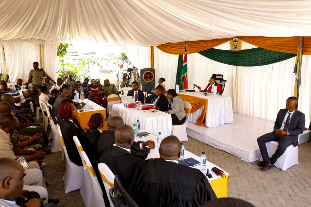 Justice Diana Mochache delivers a verdict during the Shakahola Forest massacre murder trial of self-proclaimed pastor Paul Mackenzie and his co-accused at the Mombasa Law Courts in Mombasa, Kenya, on Oct. 19, 2026. (Simon Maina/AFP via Getty Images)