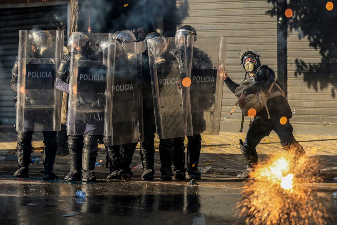 Albanian riot police officers during an anti-government demonstration in Tirana, Albania, on Oct. 20, 2026, after a week of violent anti-government protests. (Adnan Beci/AFP via Getty Images)