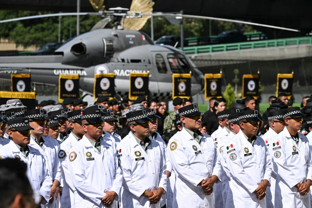 Members of Mexico's National Guard stand in formation during the signing of the Interinstitutional Coordination Agreement between the Secretariat of National Defense and the Secretariat of Security and Citizen Protection in Mexico City on Oct. 20, 2026. (Yuri Cortez/AFP via Getty Images)