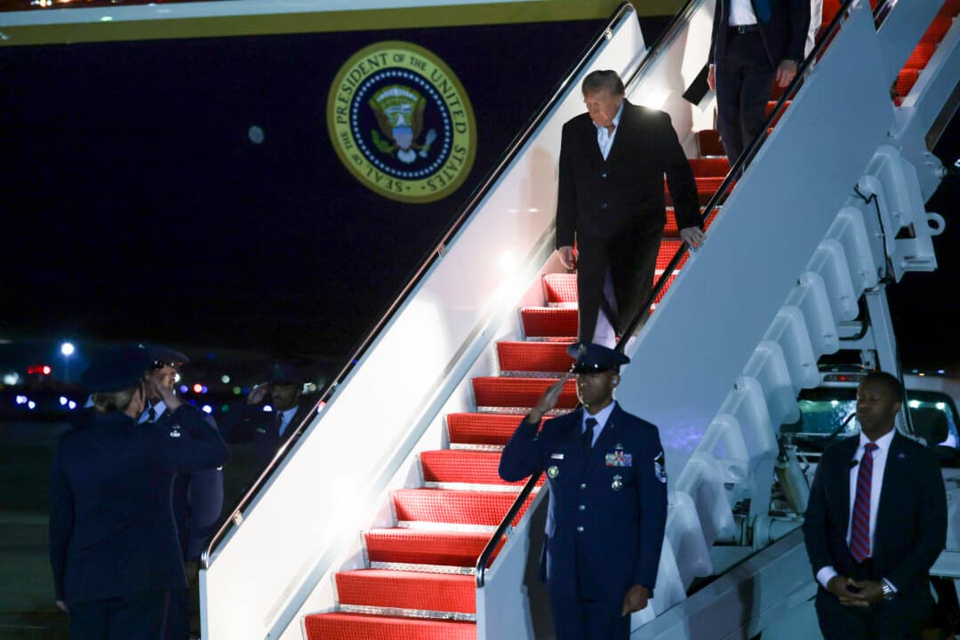 President Donald Trump walks off Air Force One at Joint Base Andrews, Md., on Oct. 20, 2026, as he campaigns for Republican candidates ahead of the Nov. 3 general election. (Anna Moneymaker/Getty Images)